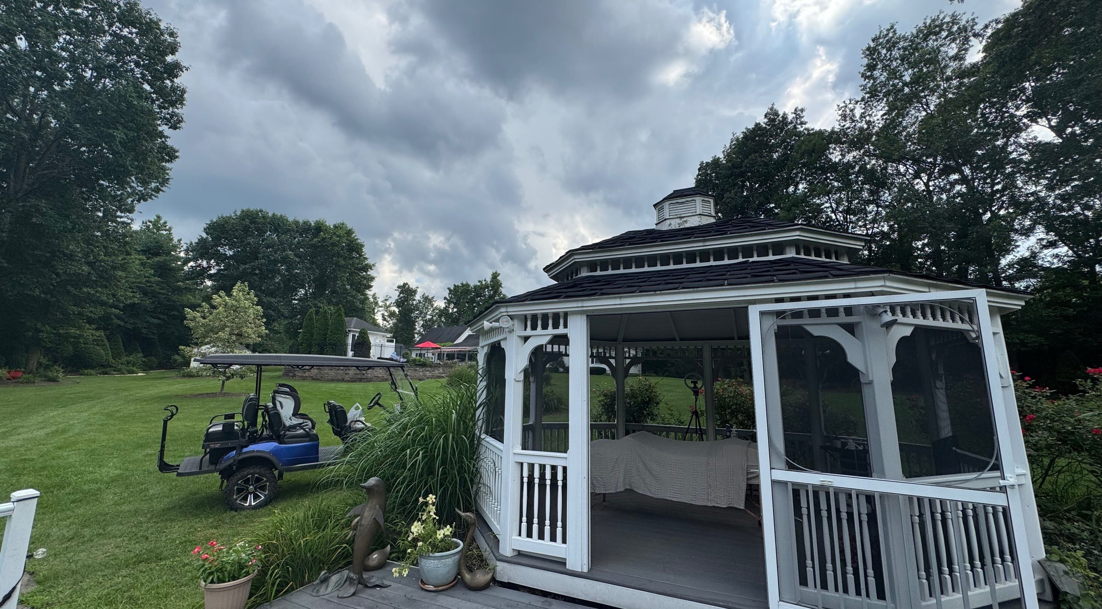 Serene gazebo at Aesthetically_Azaria, Green Lane, Pennsylvania, US, amid lush greenery.