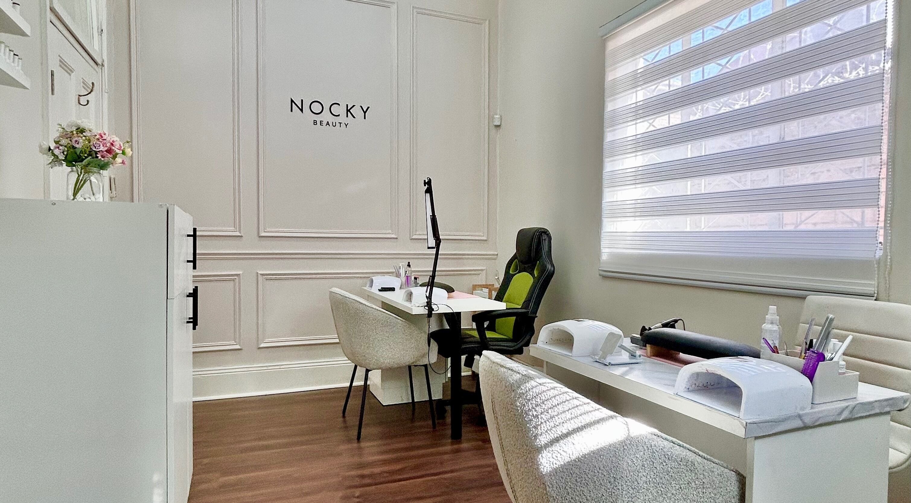 Chic nail salon space at Nocky Beauty, Durban, Kwazulu-natal, ZA with modern decor and manicuring setup.