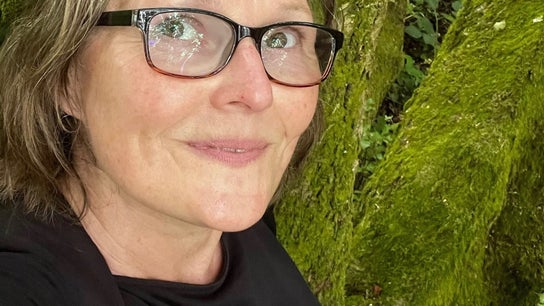 Woman enjoying nature at Linden & Light Therapy @Naturality Wellness, Berkhamsted, England, GB.