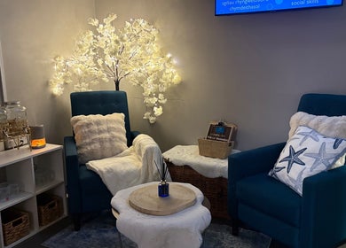 Relaxing seating area with cozy chairs in Bay Sanctuary, Swansea, Wales, GB.