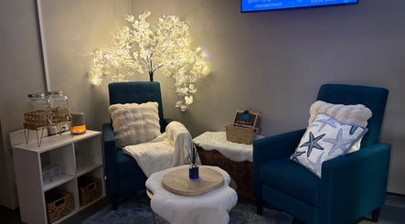 Relaxing seating area with cozy chairs in Bay Sanctuary, Swansea, Wales, GB.