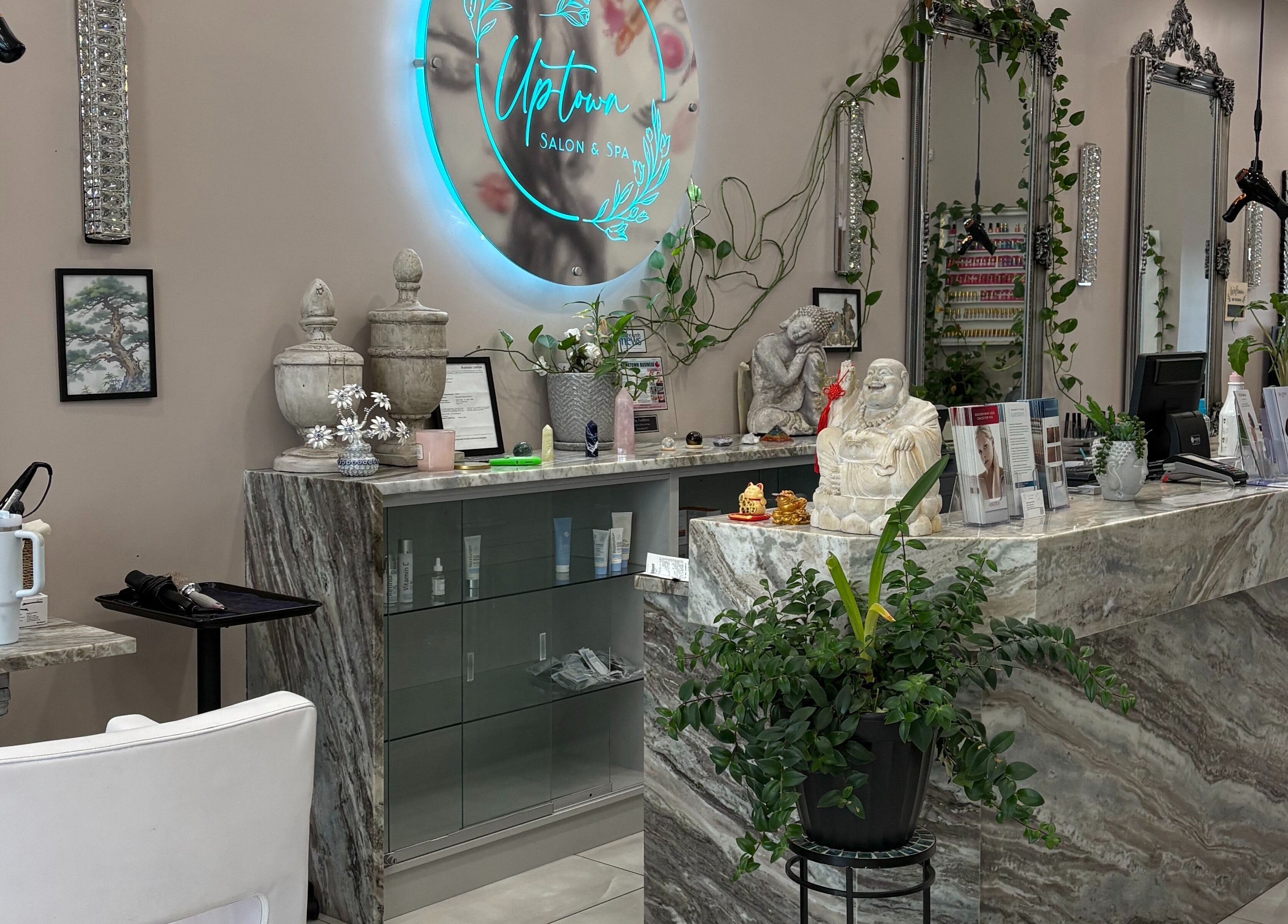 Reception area of Uptown Salon and Spa, Surrey, British Columbia, CA, featuring decor and products.