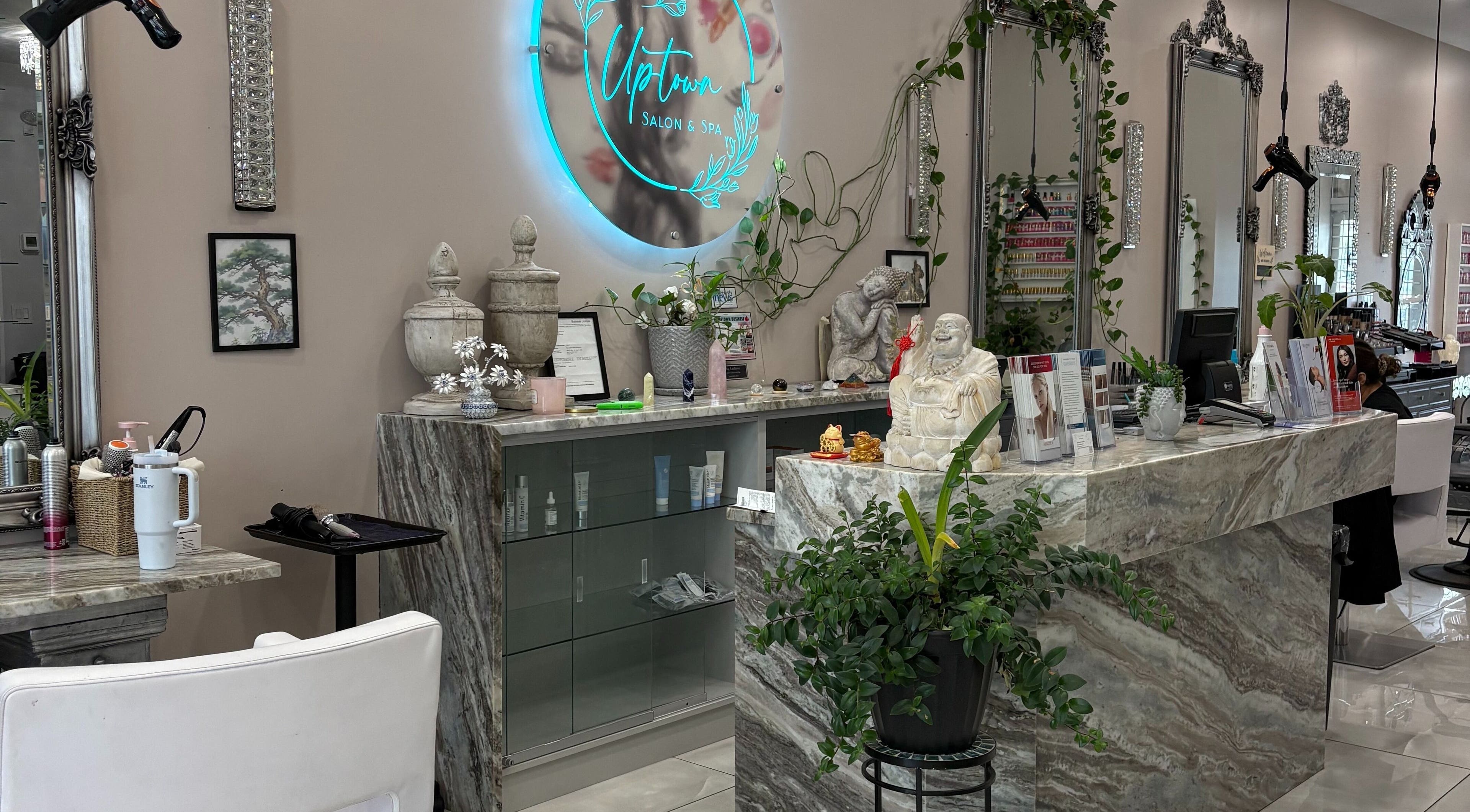 Reception area of Uptown Salon and Spa, Surrey, British Columbia, CA, featuring decor and products.