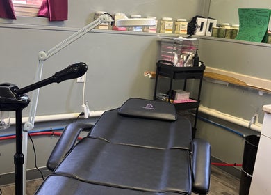 Relaxing treatment room in the Emerald Suite, Pittsburgh, Pennsylvania, US, equipped with modern spa chair.