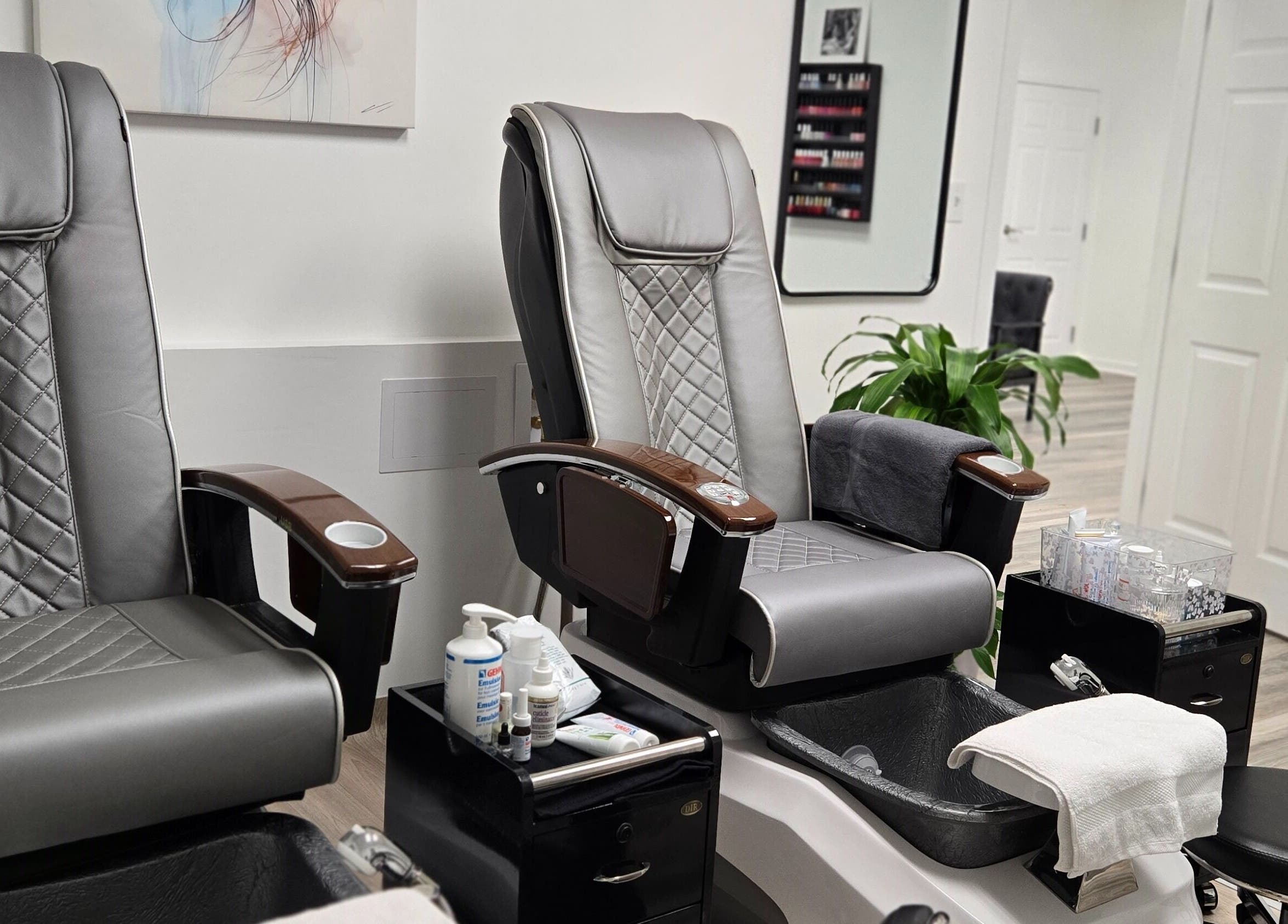 Elegant pedicure chairs at Four Seasons Beauty Salon, Doylestown, Pennsylvania, US, offering relaxing treatments.