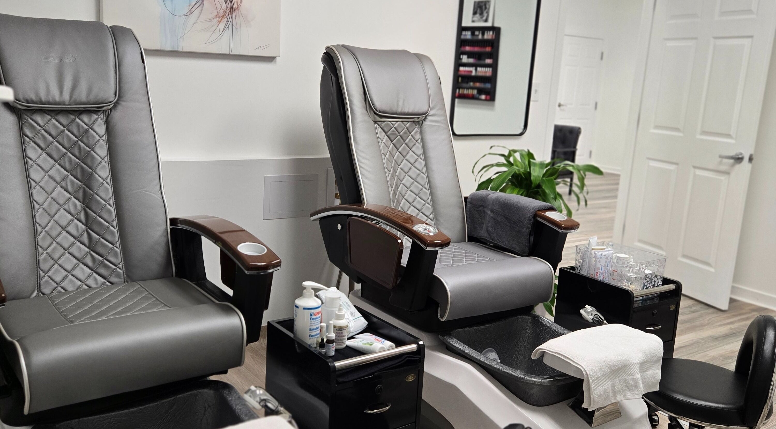 Elegant pedicure chairs at Four Seasons Beauty Salon, Doylestown, Pennsylvania, US, offering relaxing treatments.