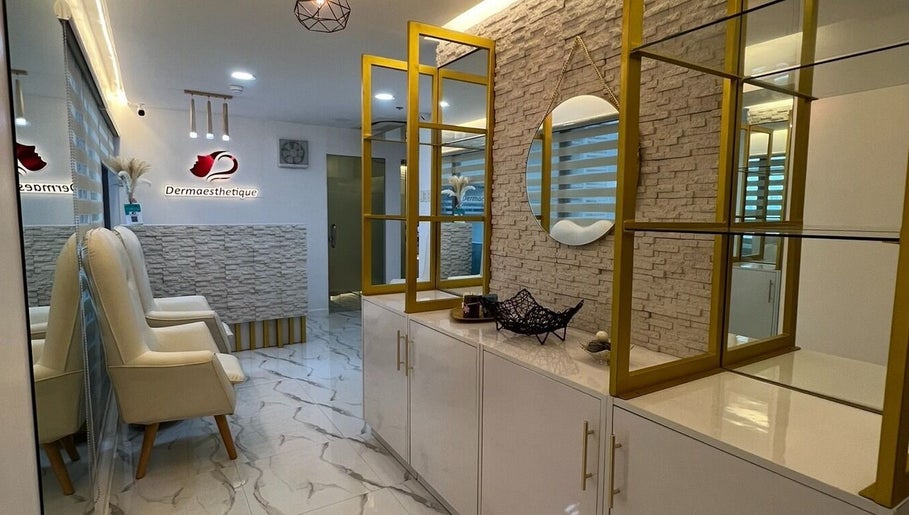 Elegant interior of Dermaesthetique - Taft in Pasay City, Metro Manila, PH featuring chic decor and seating area.