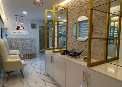 Elegant interior of Dermaesthetique - Taft in Pasay City, Metro Manila, PH featuring chic decor and seating area.