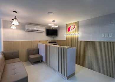 Reception area at Dermaesthetique - Taft in Pasay City, Metro Manila, PH with modern decor and seating.