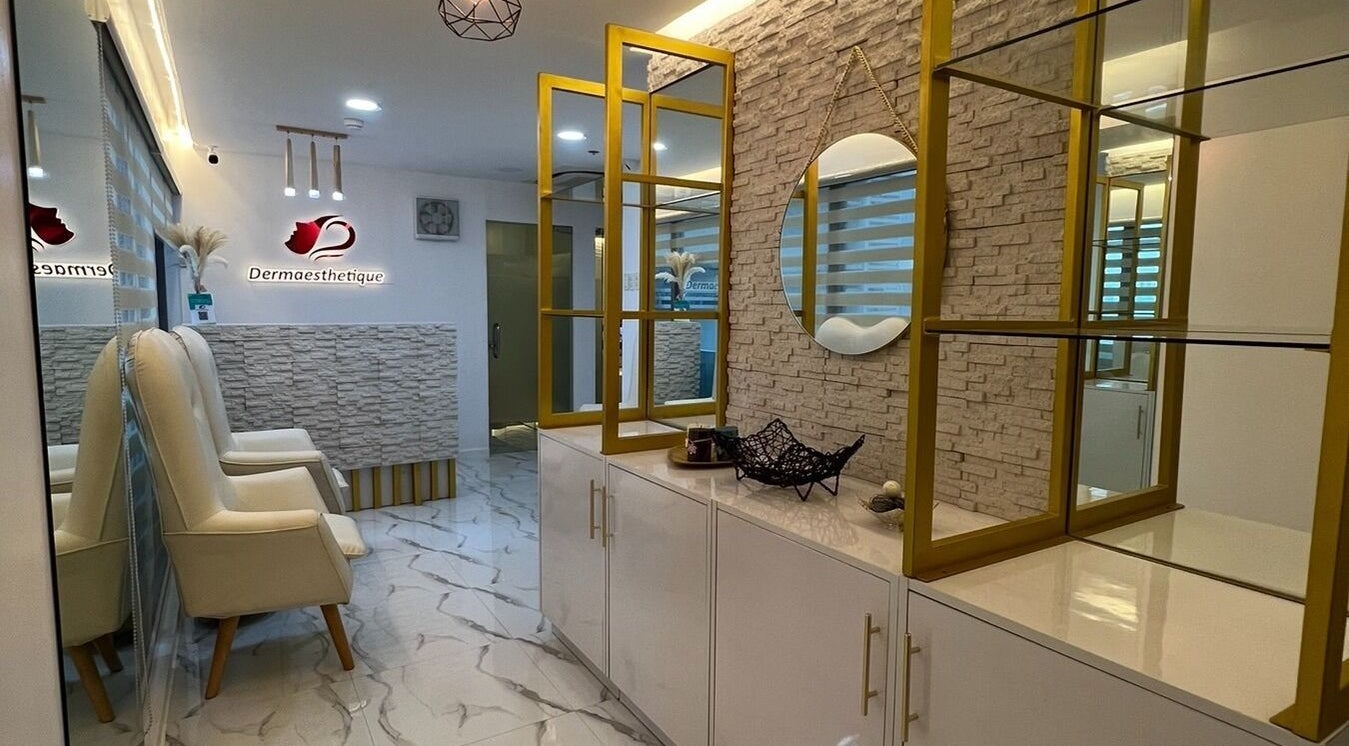 Luxurious interior of Dermaesthetique - Makati, Makati City, Metro Manila, PH. Modern decor with stylish mirrors.