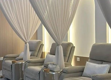 Luxurious spa chairs at Aura Velour Therapeutic Spa, San Fernando City Corporation, TT, promising ultimate relaxation.