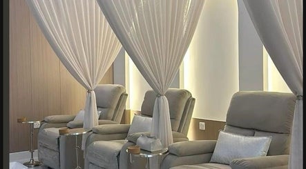 Luxurious spa chairs at Aura Velour Therapeutic Spa, San Fernando City Corporation, TT, promising ultimate relaxation.