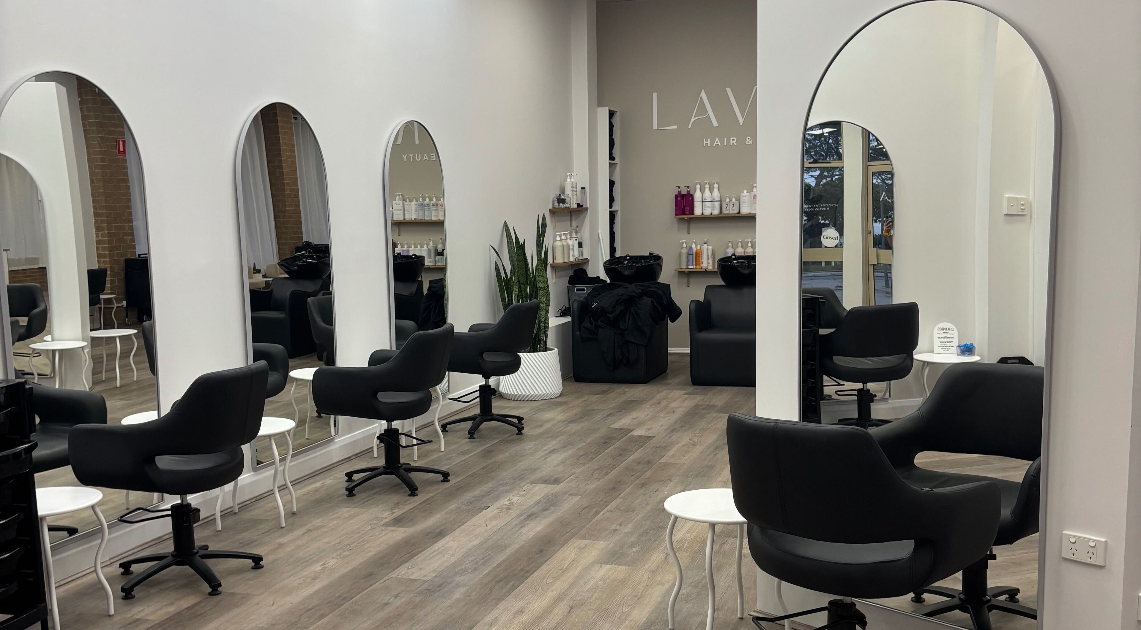 Sleek interior of Tjf Hair in Melbourne, Victoria, AU featuring stylish chairs and mirrors.