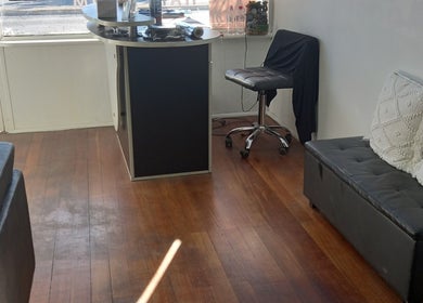 Cozy seating and styling area at Jodie's Hair Room, Woodville Park, South Australia, AU.