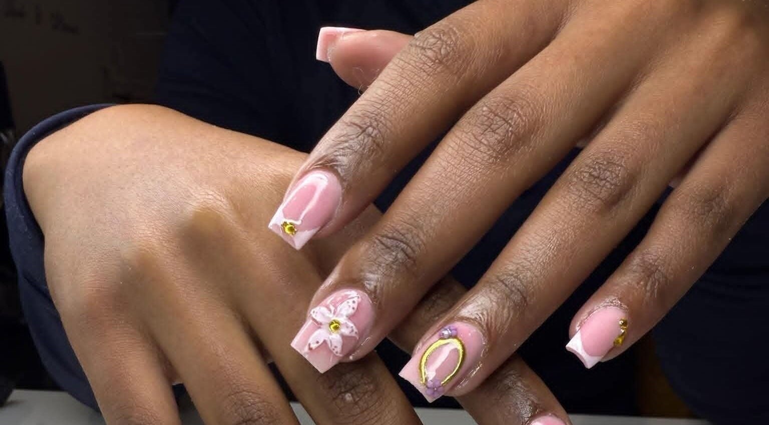 Elegant pink nail art with floral design at Onlylettynaildt, Midrand, Gauteng, ZA.