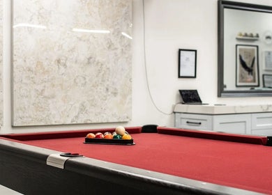 Pool table in Marc Revita - New Shanghai Barbershop, Vancouver, British Columbia, CA, creating a stylish ambiance.