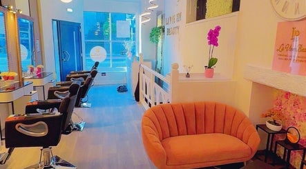 La Vie en Beauty salon in Bristol, England, GB showcases chic interior with plush seating and styling stations.