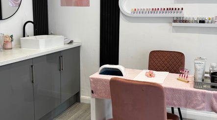 Elegant nail care station at La Vie en Beauty, Bristol, England, GB, featuring plush seating and nail polish display.