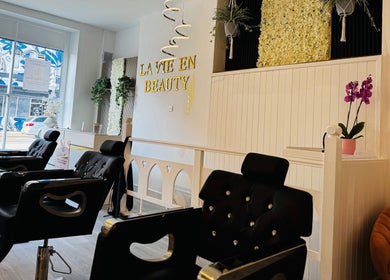 Elegant salon chairs at La Vie en Beauty, Bristol, England, GB offering a stylish beauty experience.