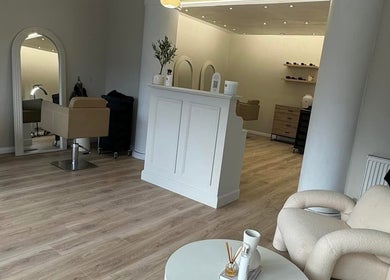 Elegant interior of Nails by Livvy & Lash & Glow by Georgia in Normanton, England, GB with stylish seating.