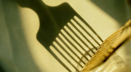 Artistic shadow of a salon tool at MaddyLox, Toronto, Ontario, CA.