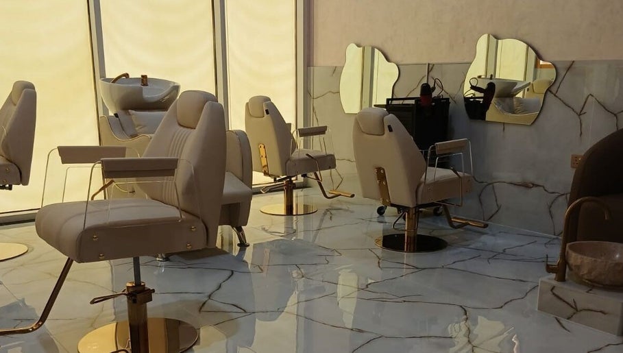 Luxurious chairs at Velvet Glow Ladies Salon in Dubai, Dubai, AE with elegant, modern design.