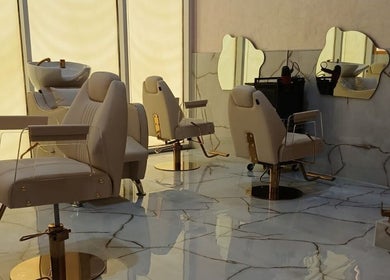Luxurious chairs at Velvet Glow Ladies Salon in Dubai, Dubai, AE with elegant, modern design.
