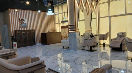 Elegant salon interior at Velvet Glow Ladies Salon, Dubai, Dubai, AE featuring stylish chairs and mirrors.