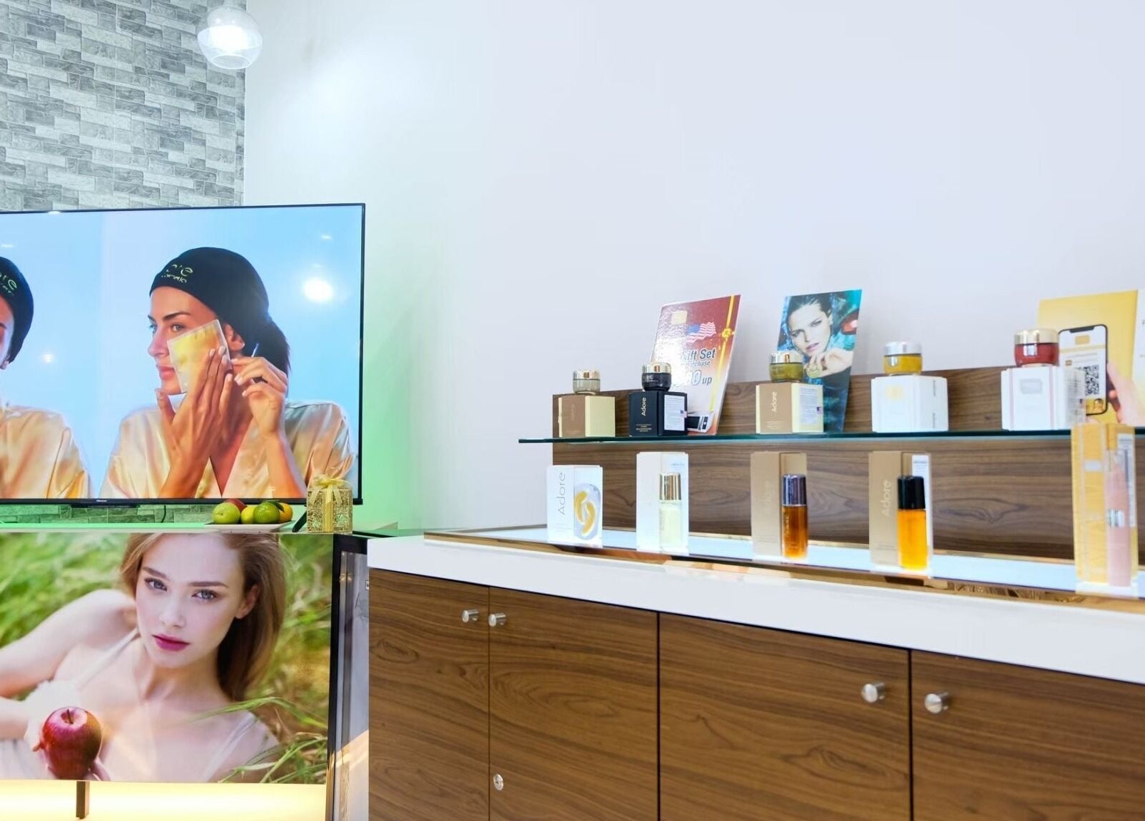 Adore Cosmetics display at Krung Thep Maha Nakhon, Thailand showing luxury skincare products and visuals.