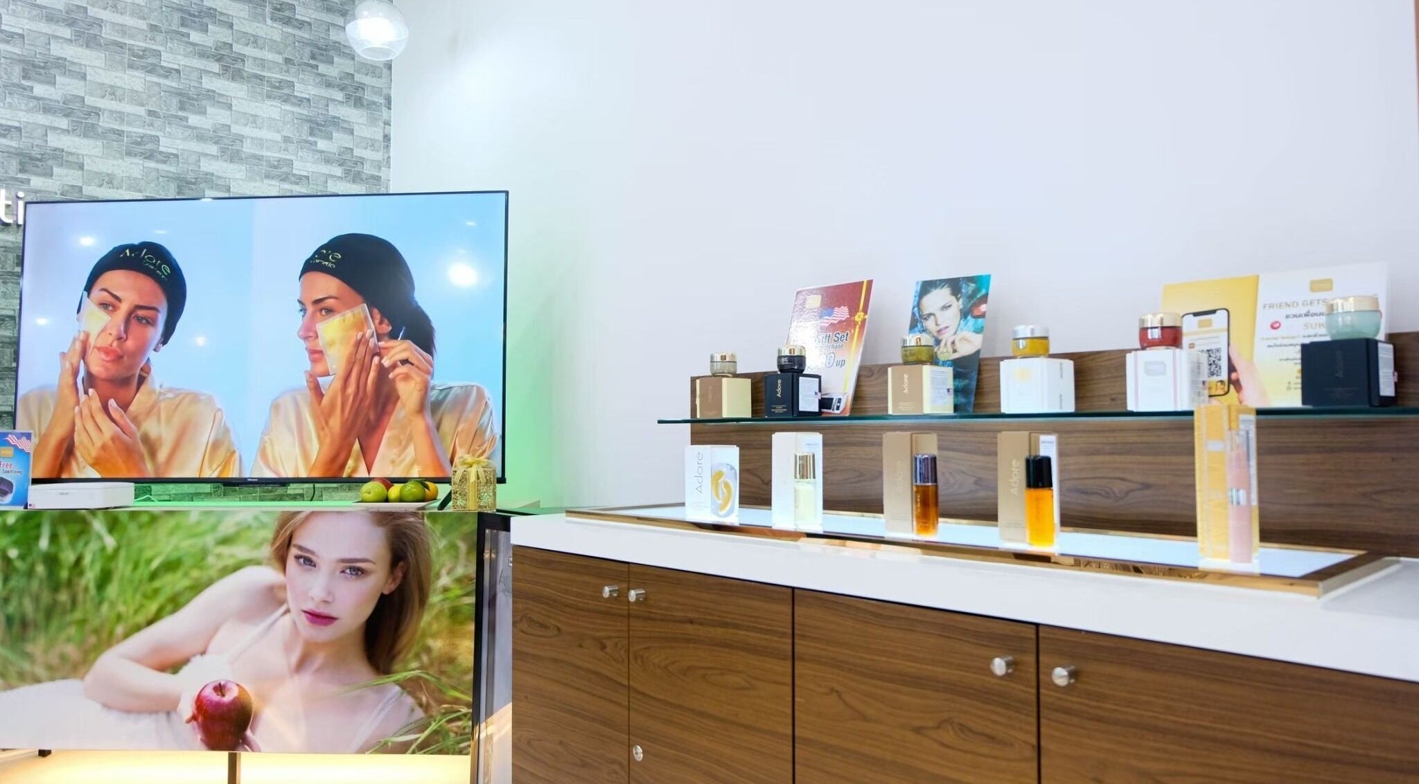 Adore Cosmetics display at Krung Thep Maha Nakhon, Thailand showing luxury skincare products and visuals.