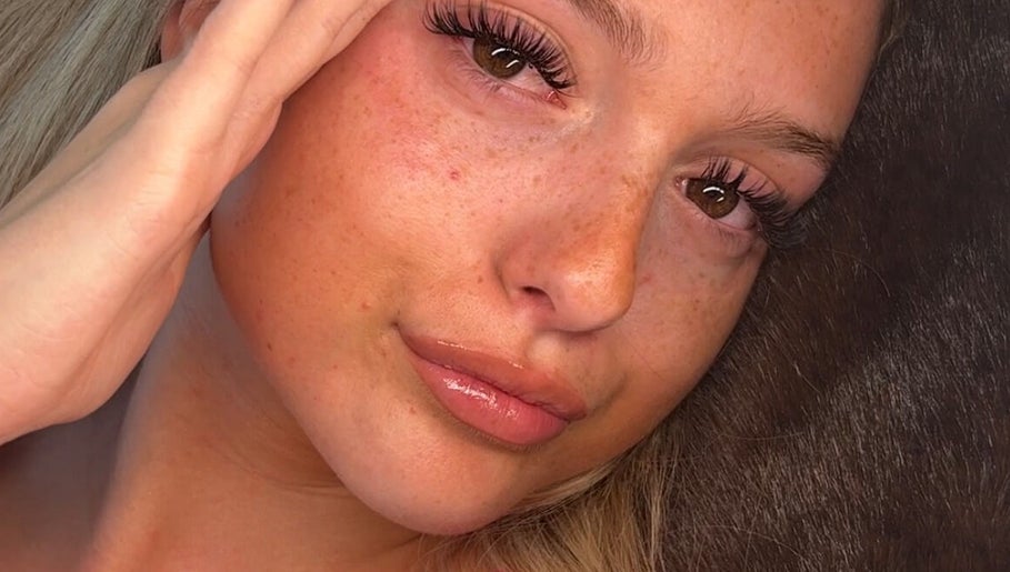 Close-up of a woman's radiant skin and flawless lashes at Mccafferyslashlab, Bournemouth, England, GB.