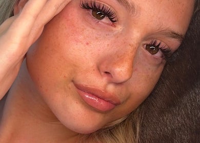 Close-up of a woman's radiant skin and flawless lashes at Mccafferyslashlab, Bournemouth, England, GB.