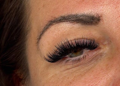 Close-up of eyelash extensions at Mccafferyslashlab, Bournemouth, England, GB. Highlighting intricate lash styling.