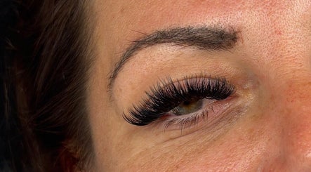Close-up of eyelash extensions at Mccafferyslashlab, Bournemouth, England, GB. Highlighting intricate lash styling.