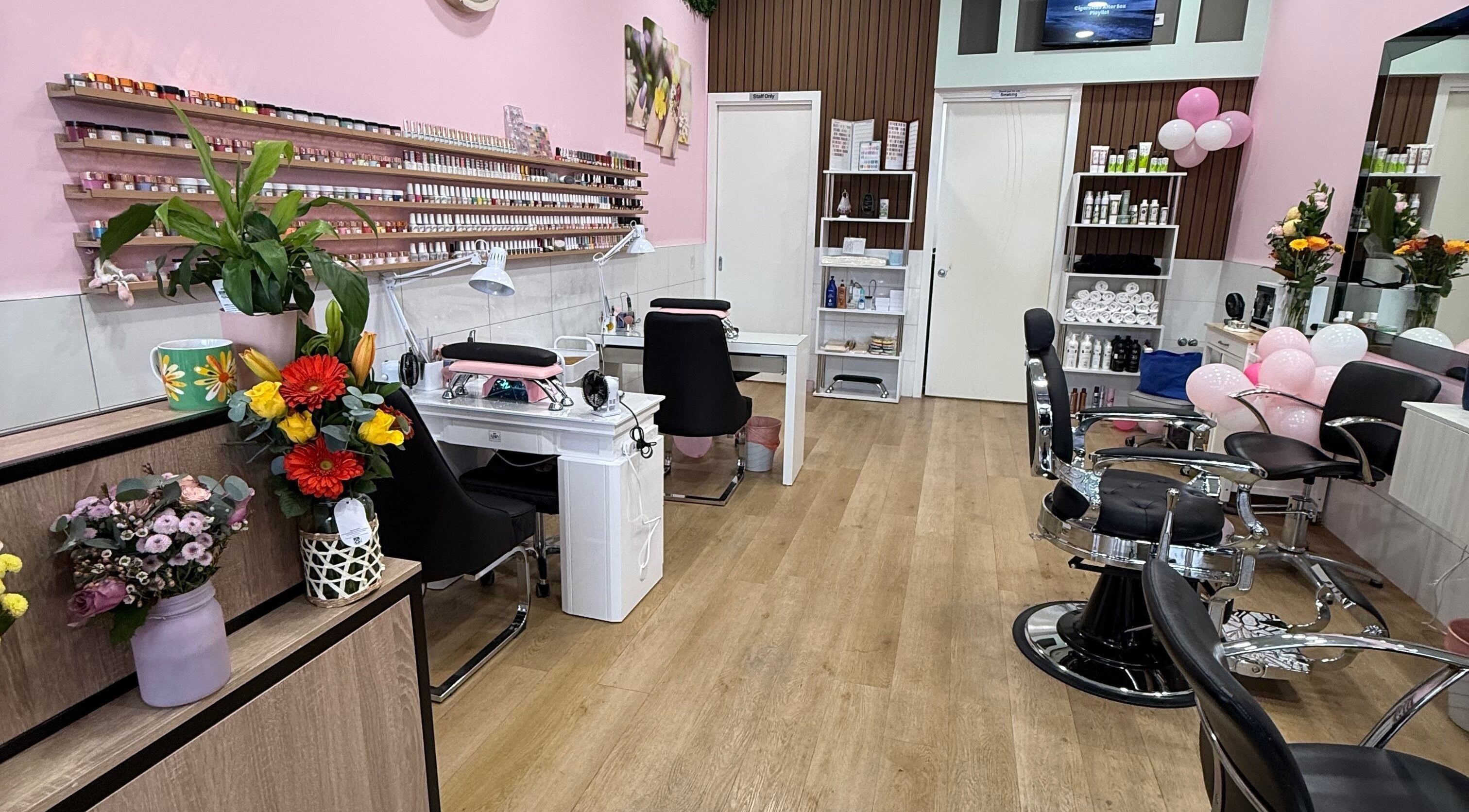 Interior of My Brows & Beauty Nail Salon in Melbourne, Victoria, AU showcasing nail stations and modern décor.