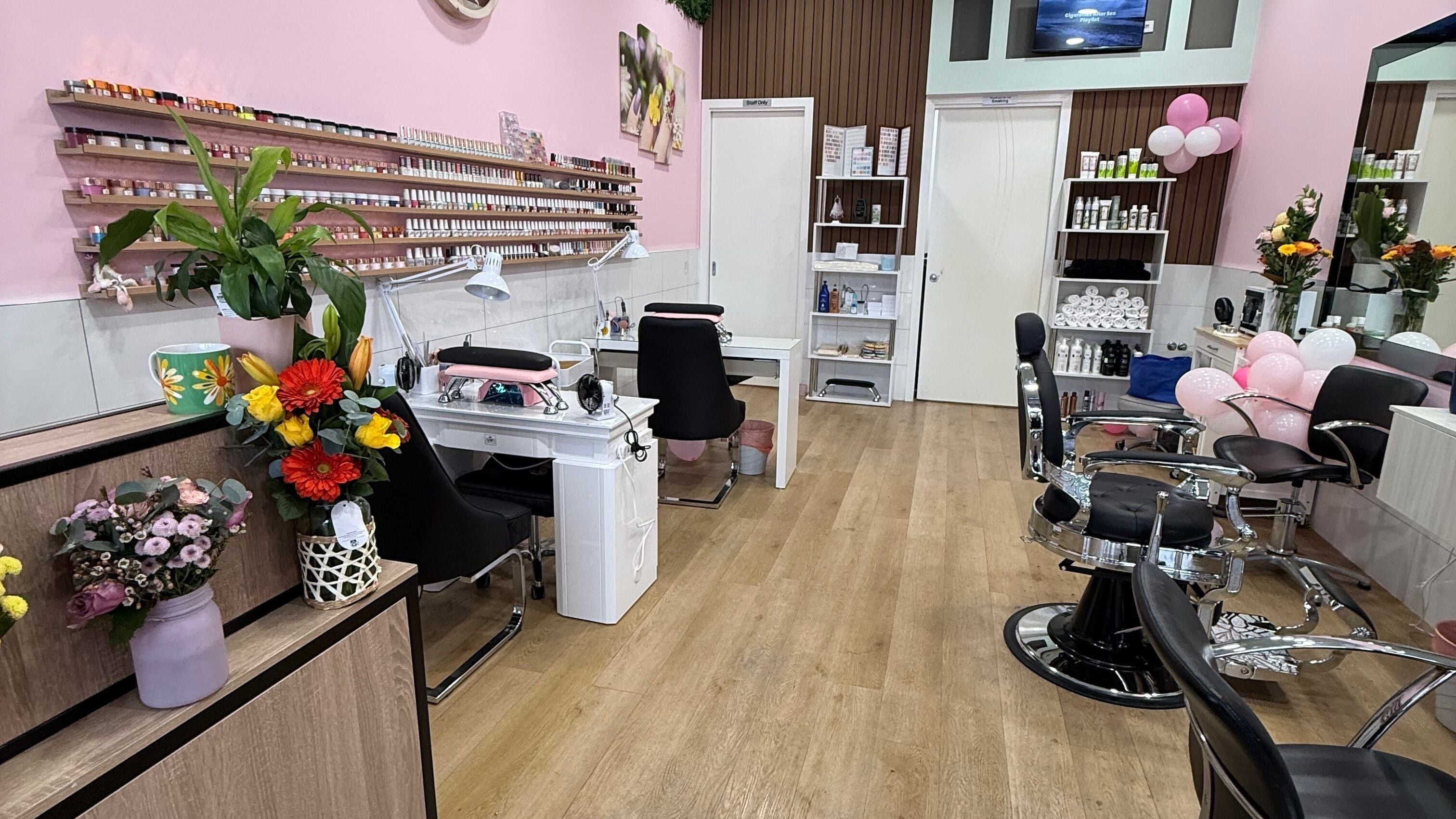 Interior of My Brows & Beauty Nail Salon in Melbourne, Victoria, AU showcasing nail stations and modern décor.