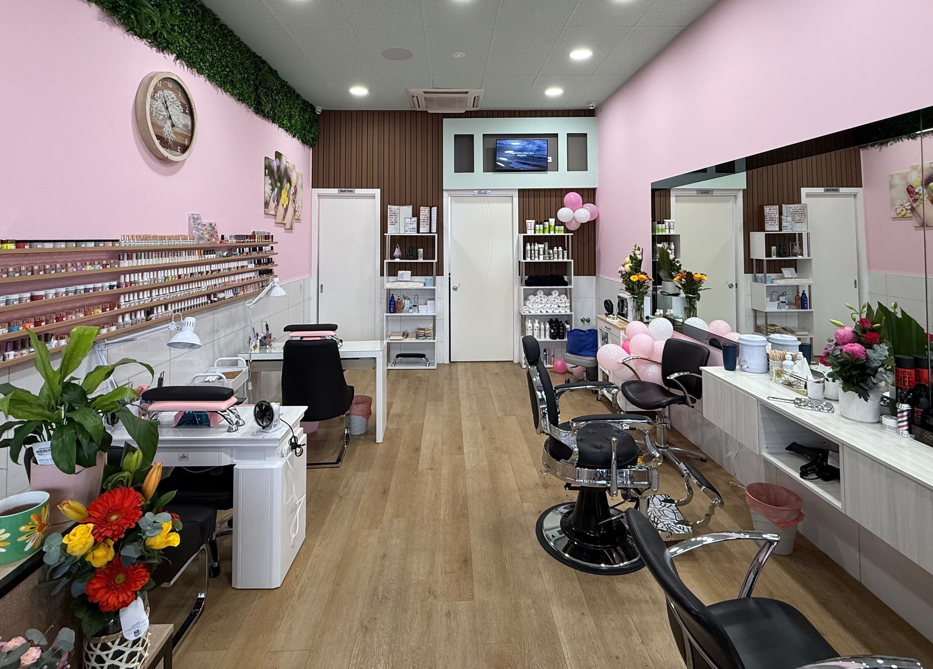 Interior of Master Cuts & Ca. with stylish decor in Melbourne, Victoria, AU, featuring chairs and beauty products.