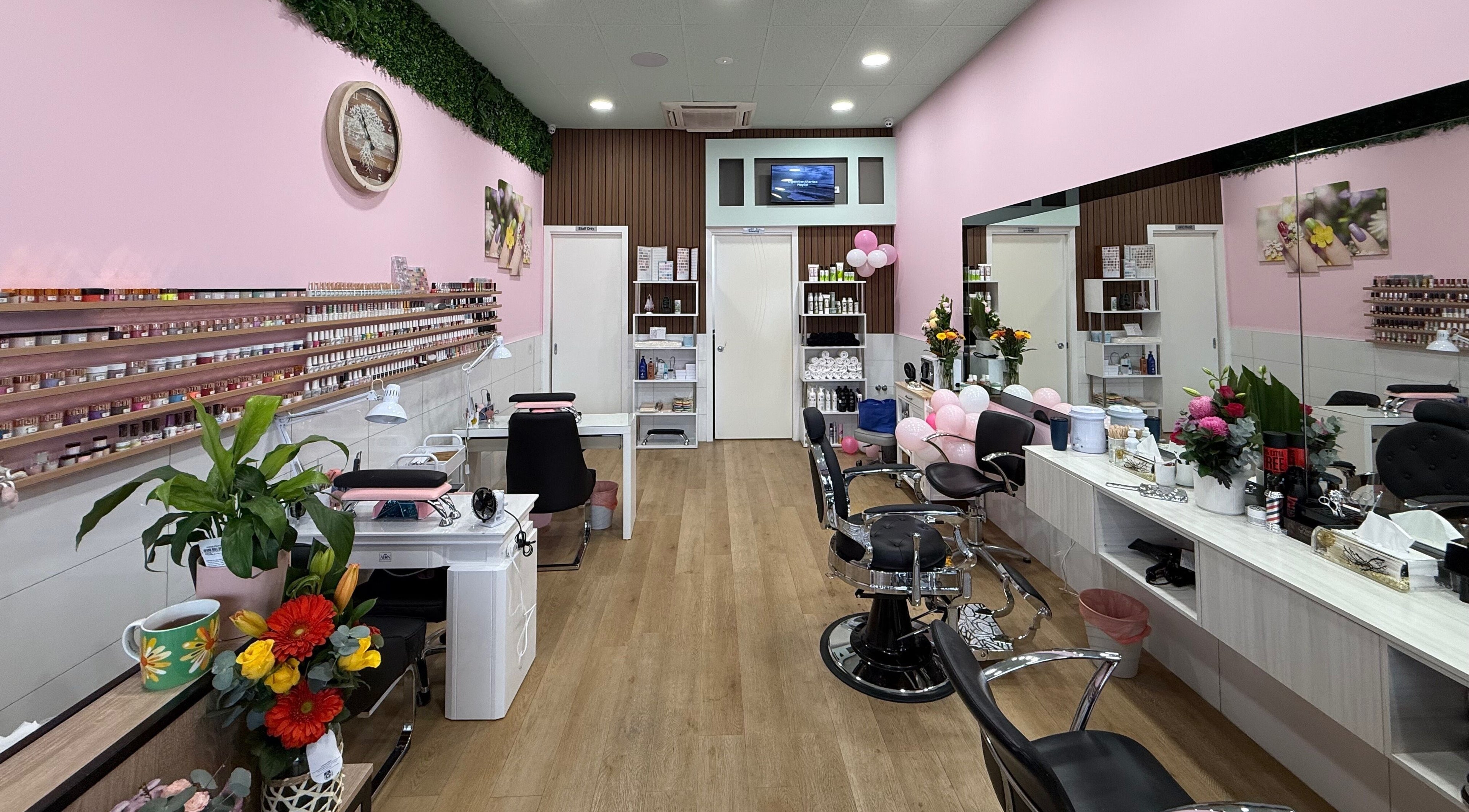 Interior of Master Cuts & Ca. with stylish decor in Melbourne, Victoria, AU, featuring chairs and beauty products.