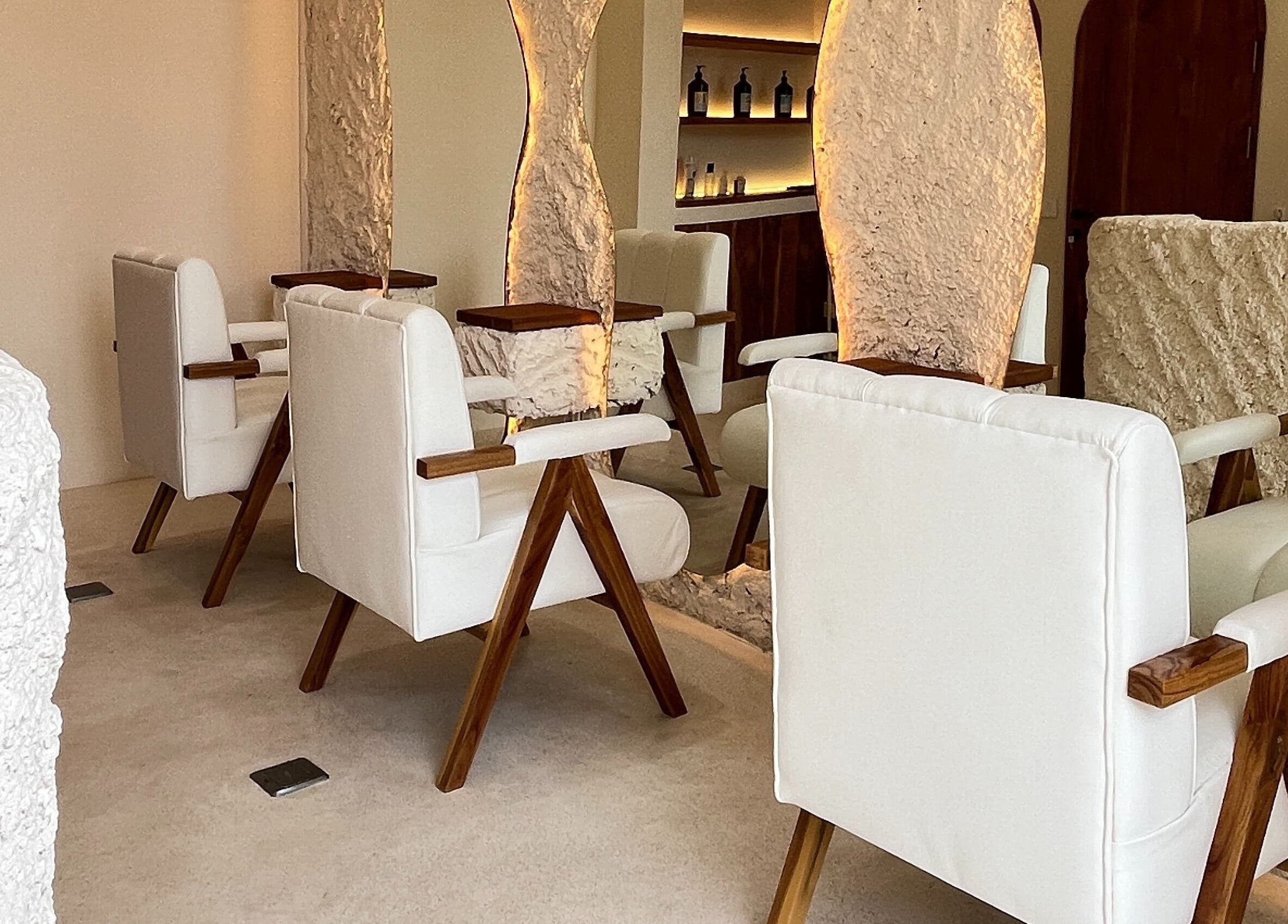 Elegant salon chairs and rustic decor at The Pause Hair Salon and Head Spa, Bali, Bali, ID.