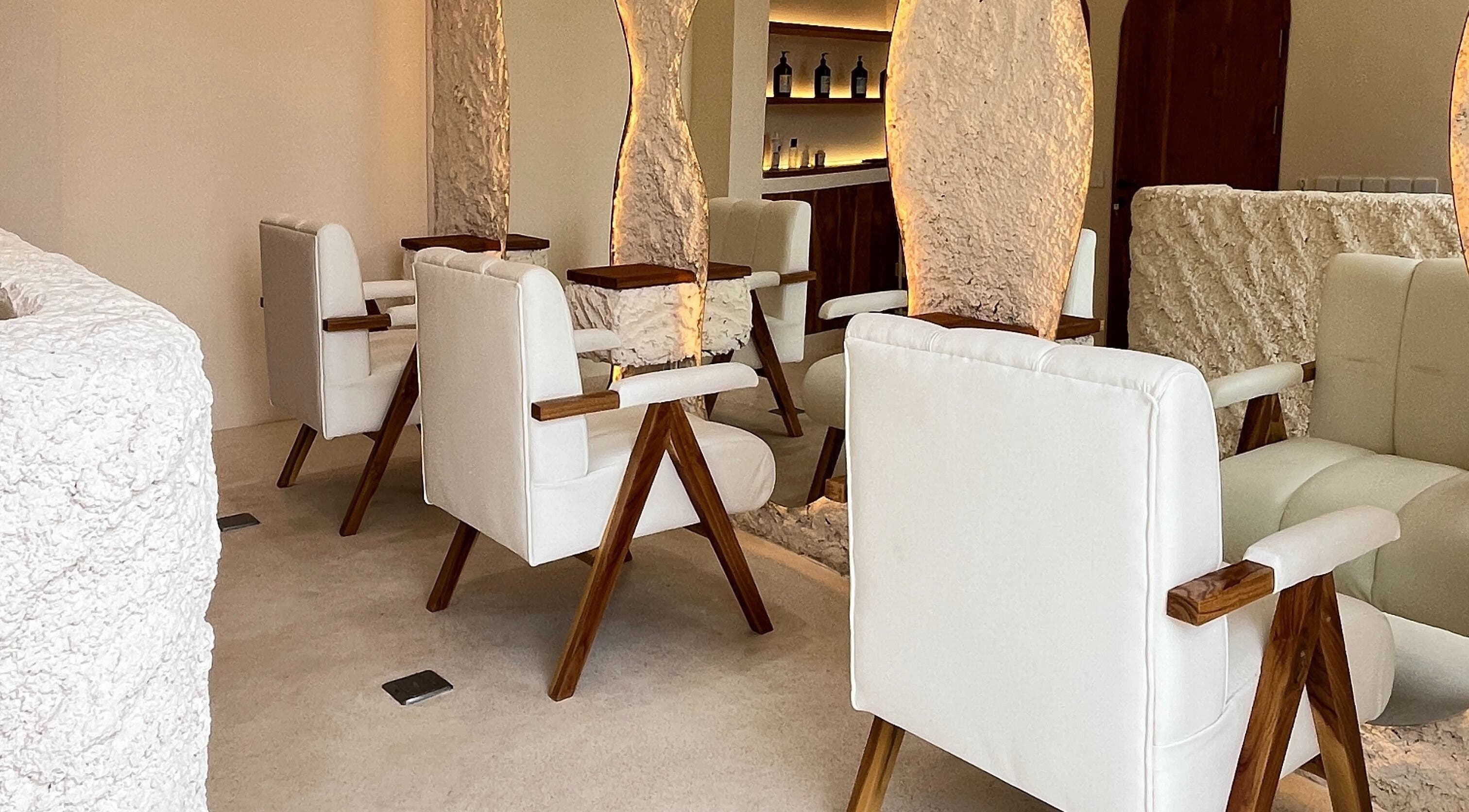 Elegant salon chairs and rustic decor at The Pause Hair Salon and Head Spa, Bali, Bali, ID.