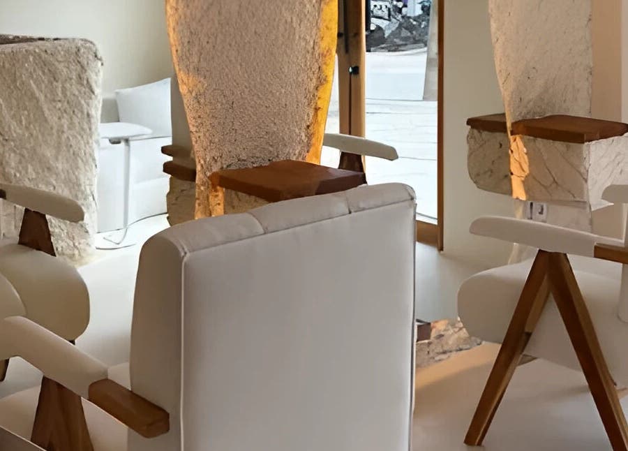 Chic interior of The Pause Hair Salon and Head Spa, featuring sleek white chairs, Bali, Bali, ID.