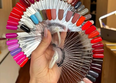 A variety of nail polish colors on display at Angel Nails in Uccle, Bruxelles, BE.