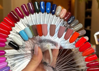 Diverse nail polish colors at Angel Nails in Uccle, Bruxelles, BE, showcasing vibrant styling options.