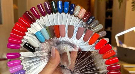 Diverse nail polish colors at Angel Nails in Uccle, Bruxelles, BE, showcasing vibrant styling options.