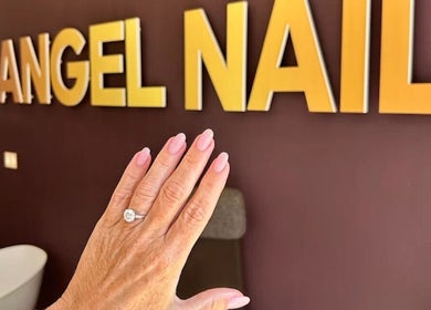 Elegant hand with pink nails at Angel Nails, Uccle, Bruxelles, BE.