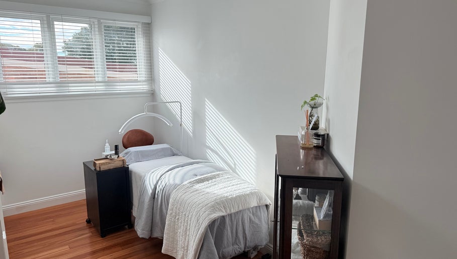 Relaxing treatment room at Ember Lash, Lilyfield, New South Wales, AU with a comfy bed and soothing decor.