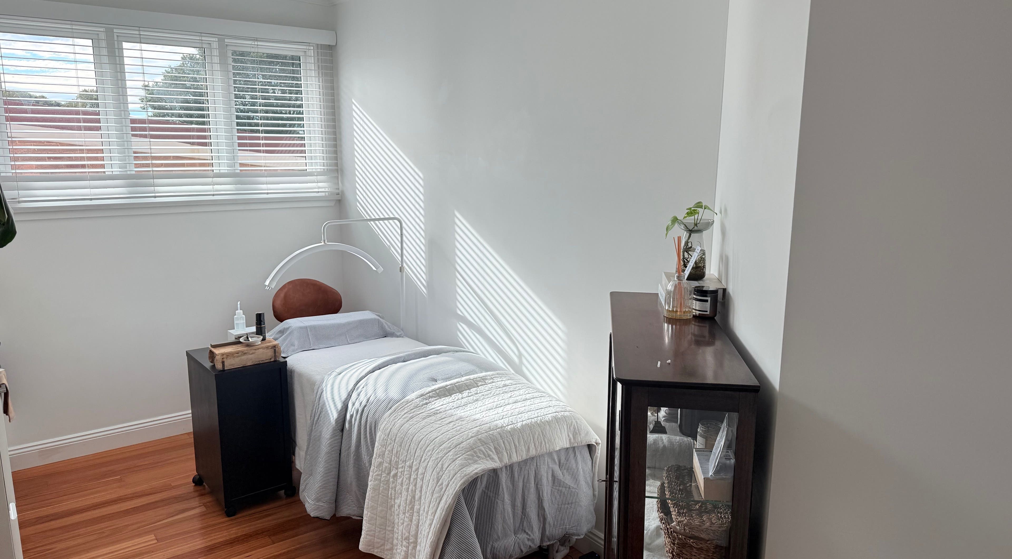 Relaxing treatment room at Ember Lash, Lilyfield, New South Wales, AU with a comfy bed and soothing decor.