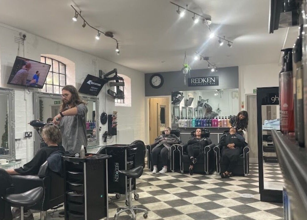 Gloss&Glam Tamworth salon interior showing hairstylists at work, Tamworth, England, GB.