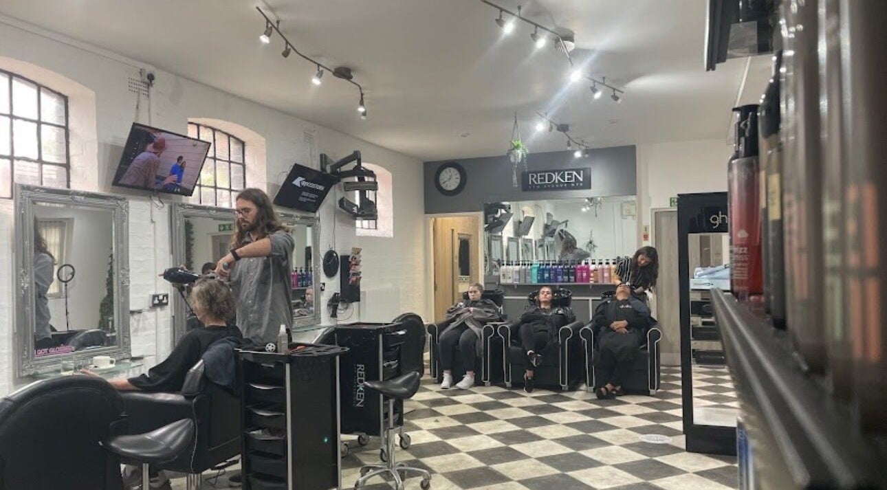 Gloss&Glam Tamworth salon interior showing hairstylists at work, Tamworth, England, GB.