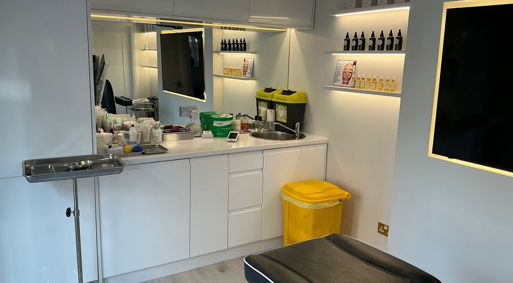 Modern treatment room at Yildiz Beauty Confidence, Loughton, England, GB, featuring sleek design and equipment.